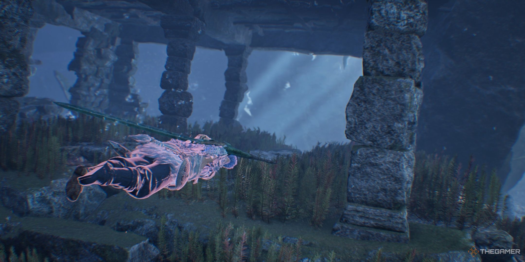 A hunter swimming through ruins in the scarlet forest in monster hunter wilds.