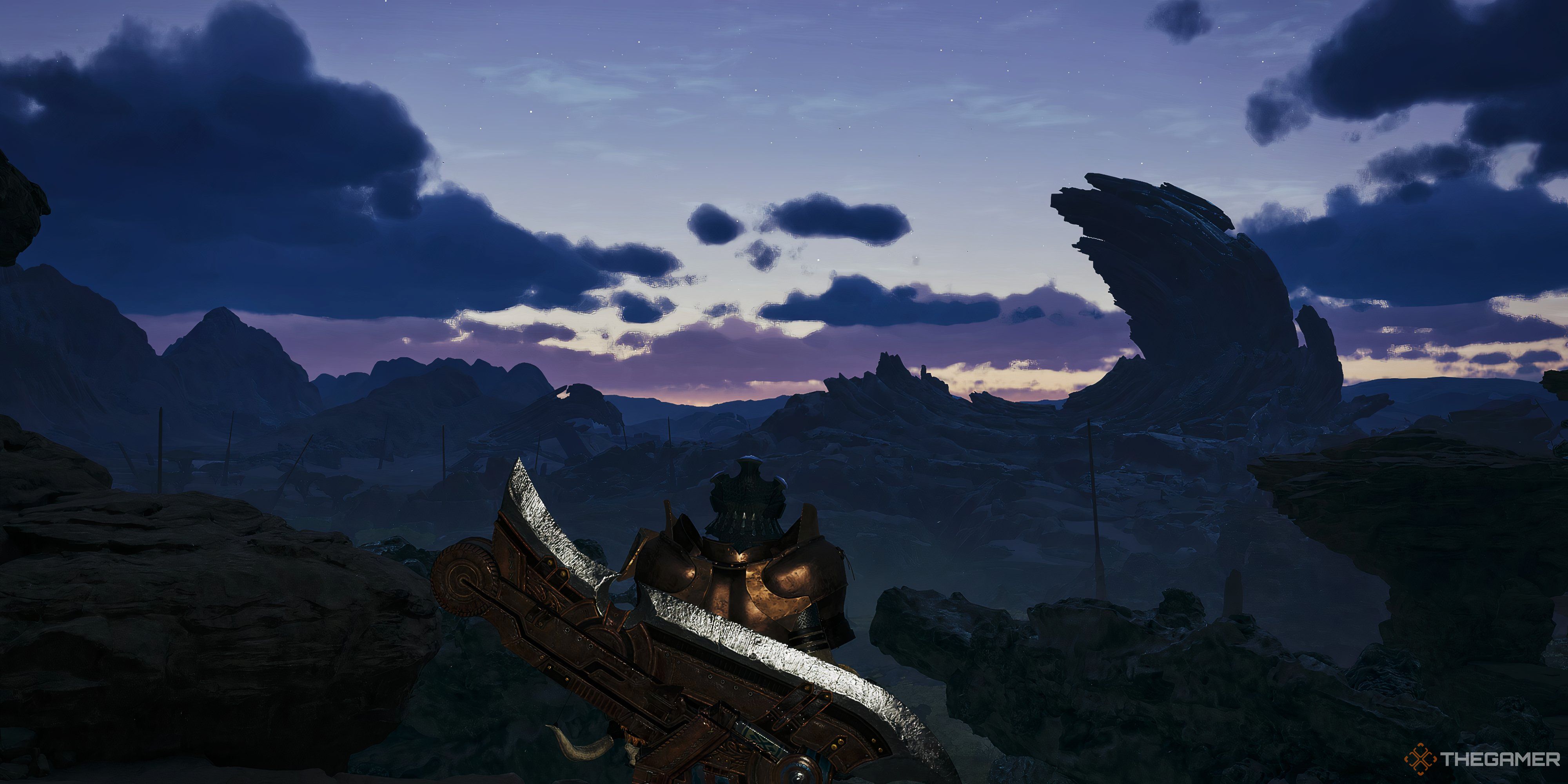 Monster Hunter Wilds character looking at large structure off in distance with the sky getting darker. There are rock formations around him.