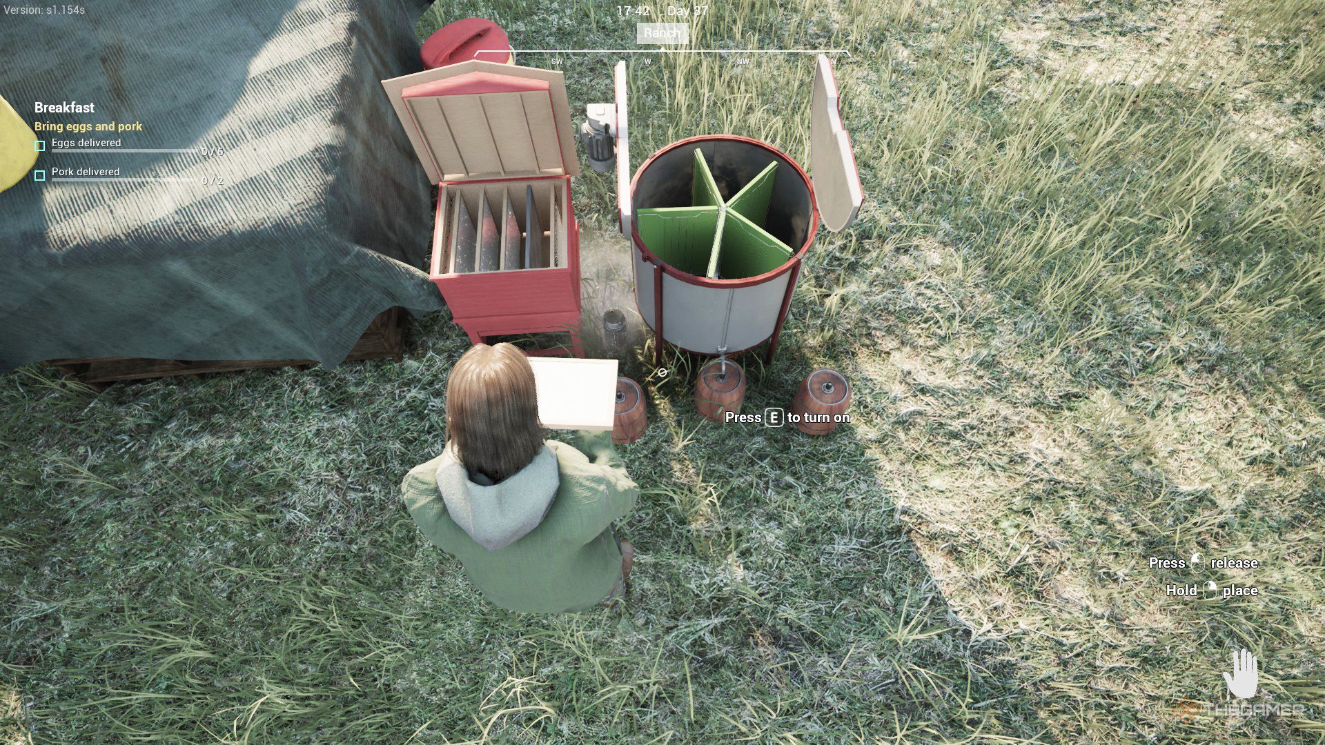 The player prepares to place hive frames inside the honey extractor in Ranch Simulator