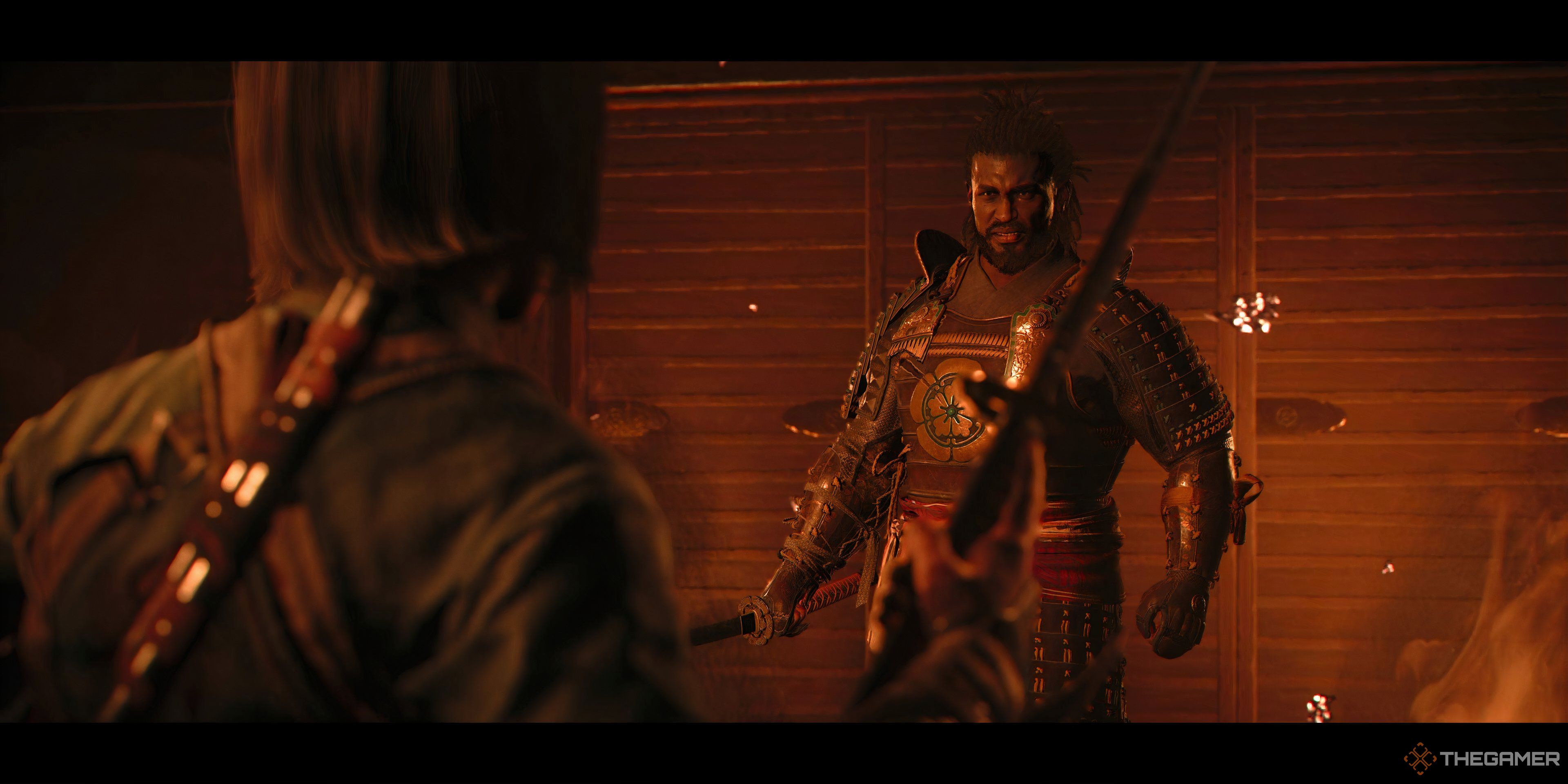 Yasuk and Nau's screenshot in a burning building in the shadow of a Haasan, who faces each other.