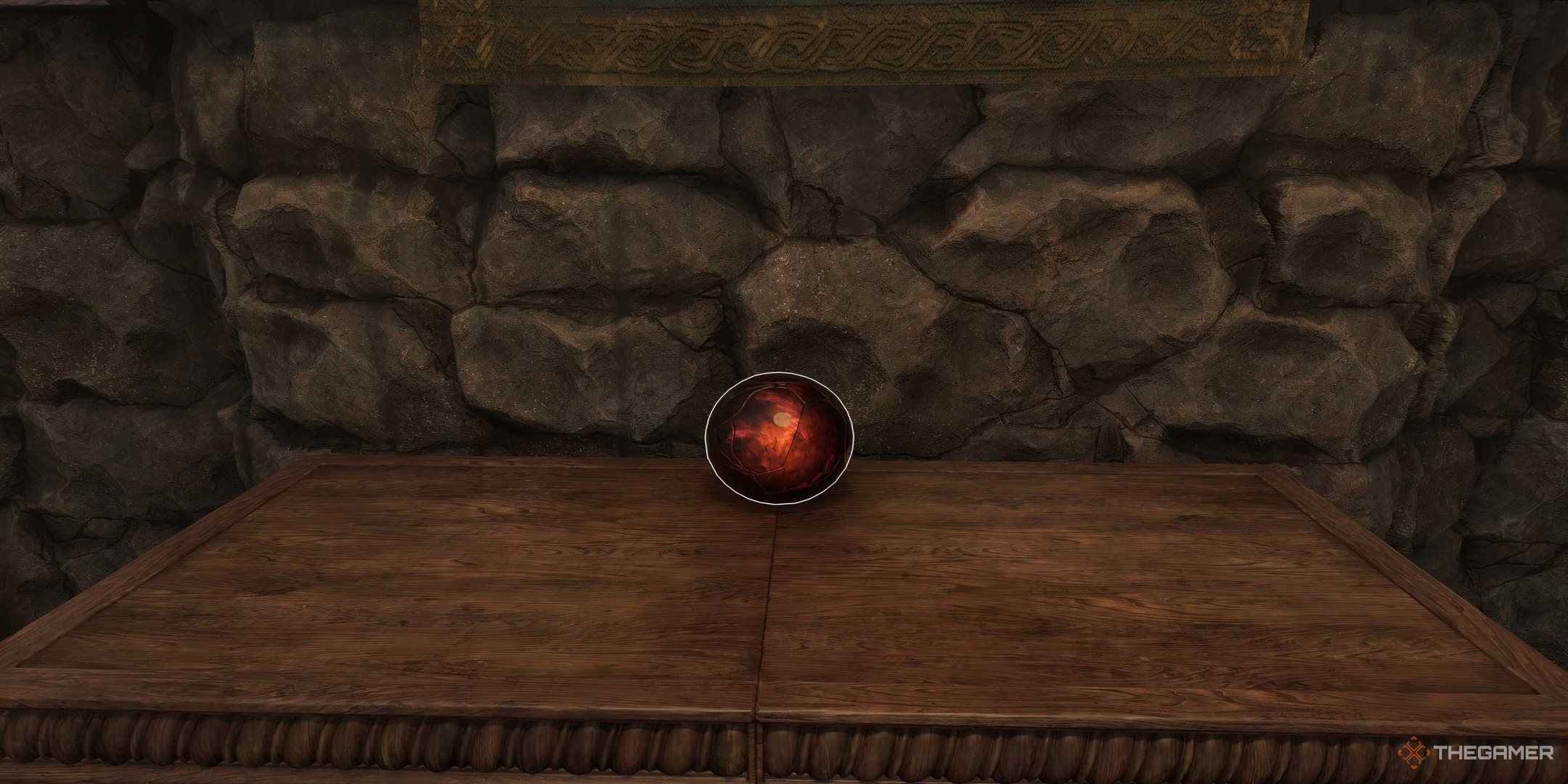 A Sigil Stone from The Elder Scrolls IV: Oblivion Remastered on a table in the Mages Guild.