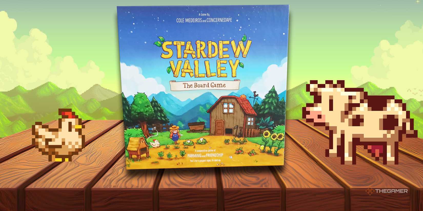 The Stardew Valley board game box is on a picnic table.