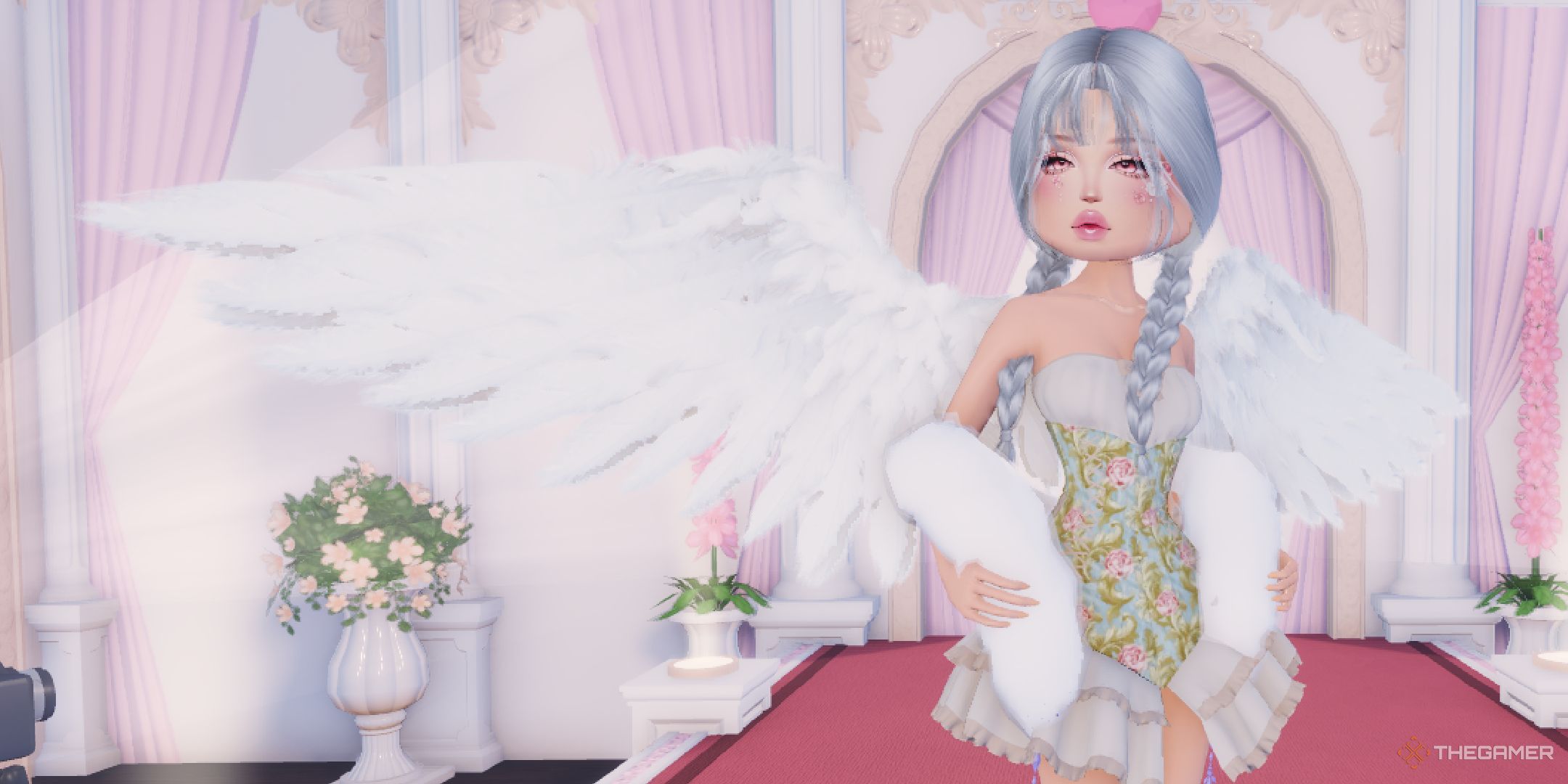 A close up of a player with white hair and wings in Dress to Impress on Roblox.