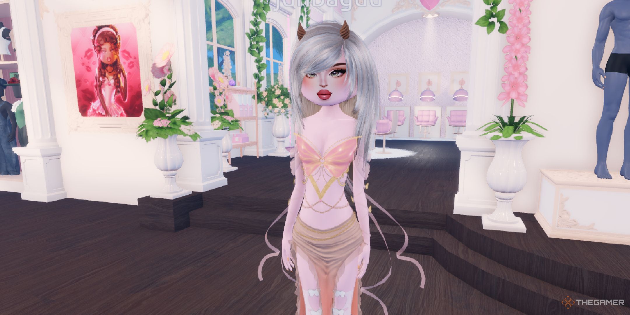 A player wearing the small horns in Dress to Impress on Roblox.