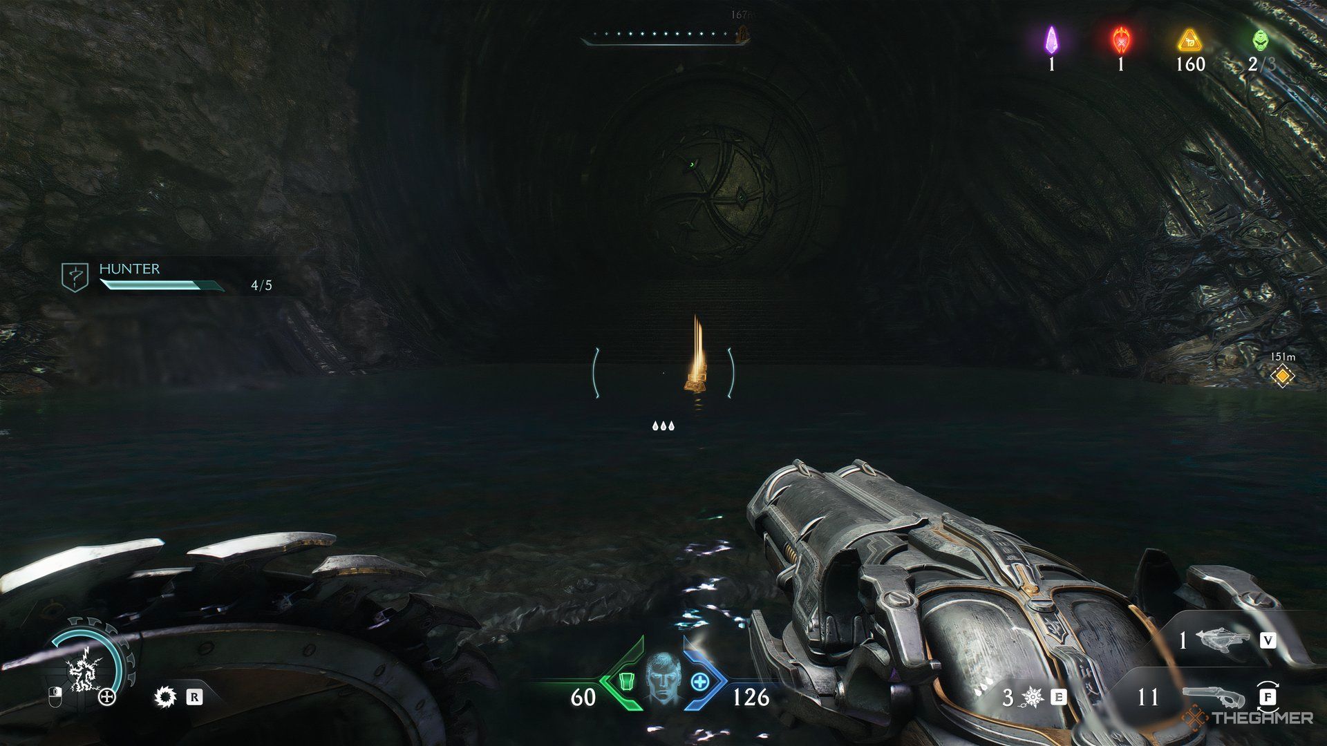 Doom Slayer walking up to a door with gold pieces in front of it in Doom: The Dark Ages.