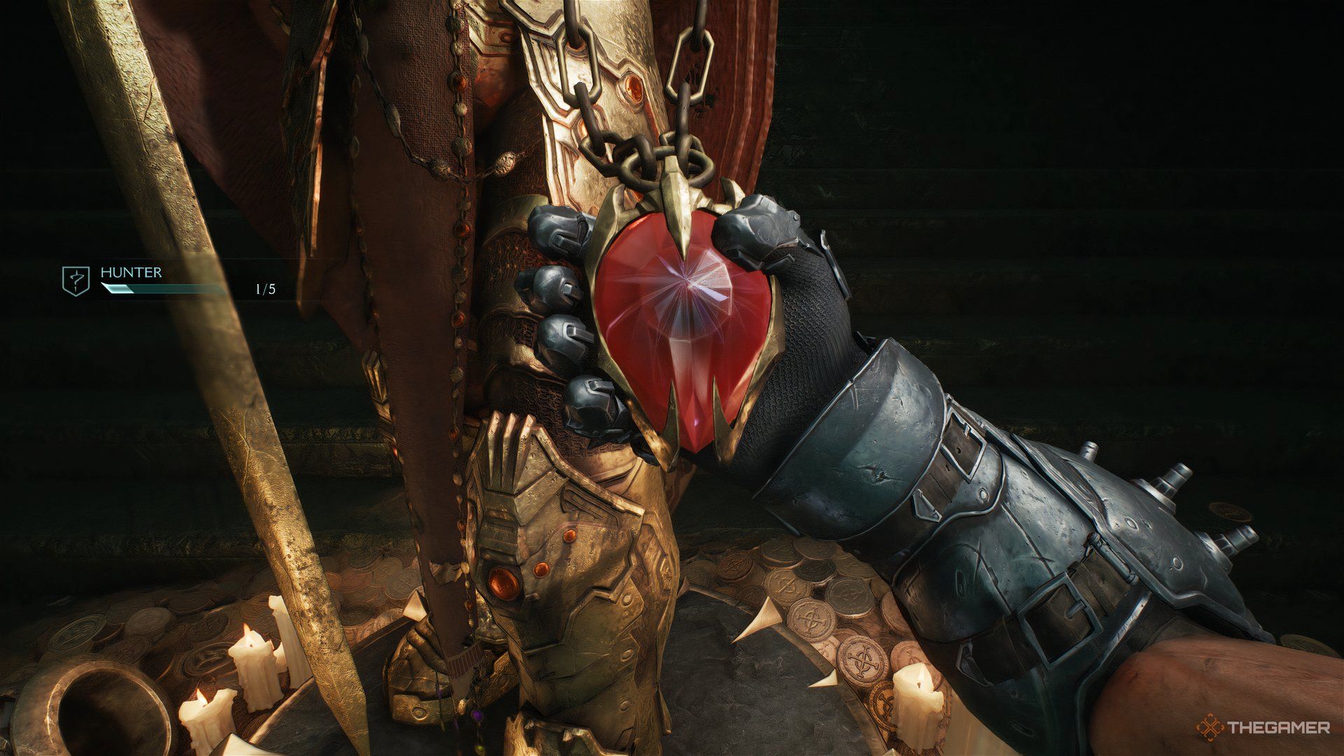 Doom Slayer taking a ruby from a statue in Doom: The Dark Ages. 