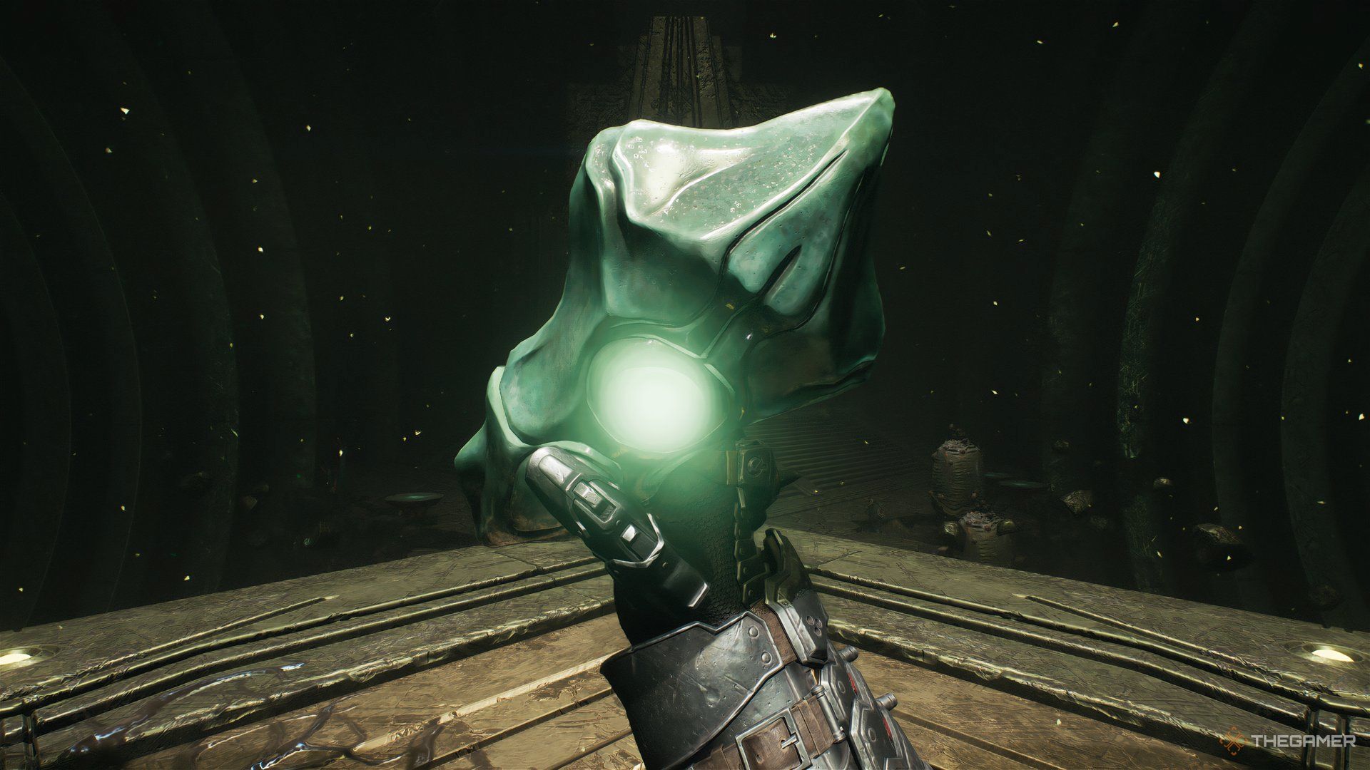 Doom Slayer holding the green Relic Key in Doom: The Dark Ages.
