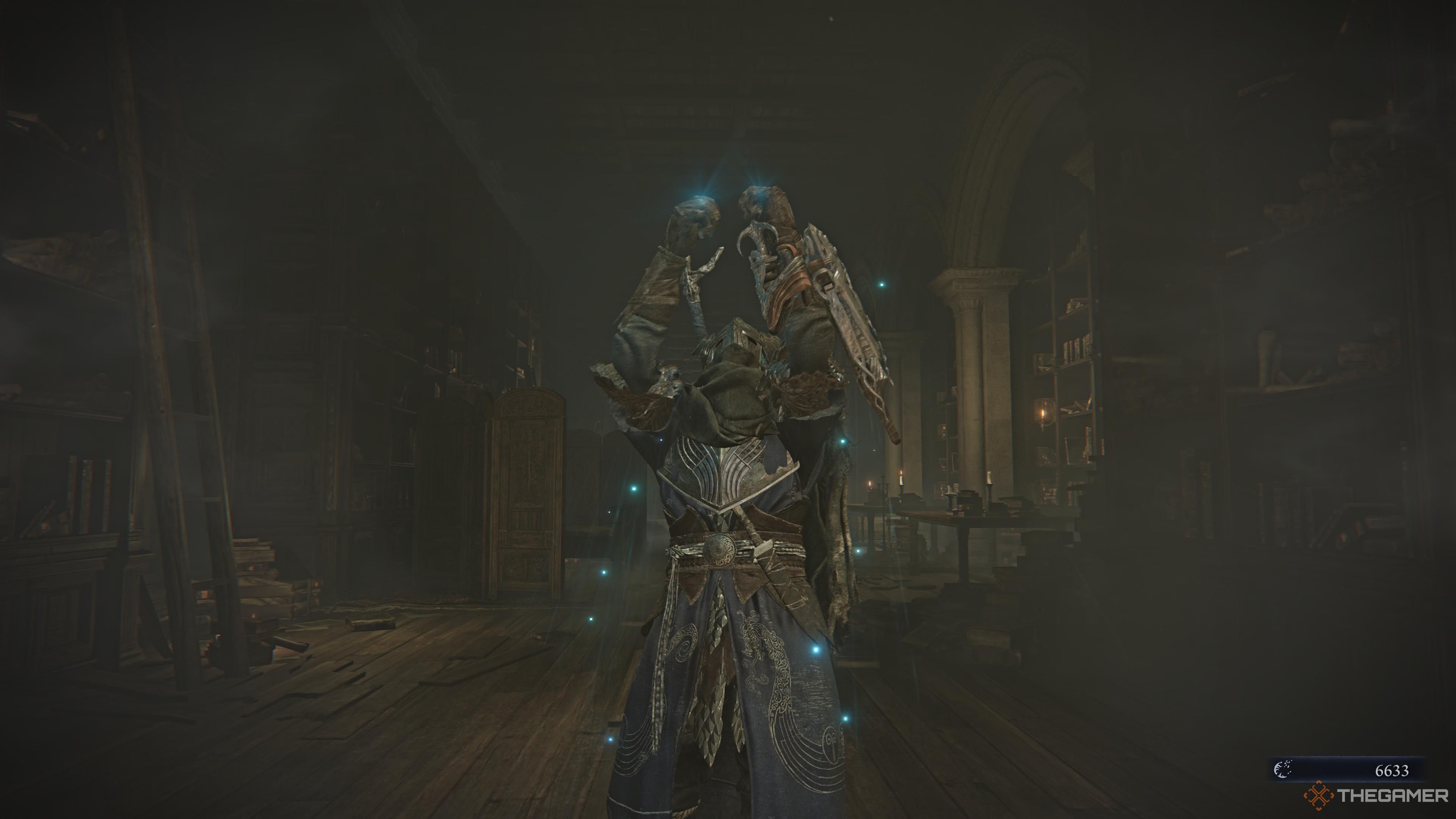 Wilder Eldon holds two earrings in Rang Knight Traigan.