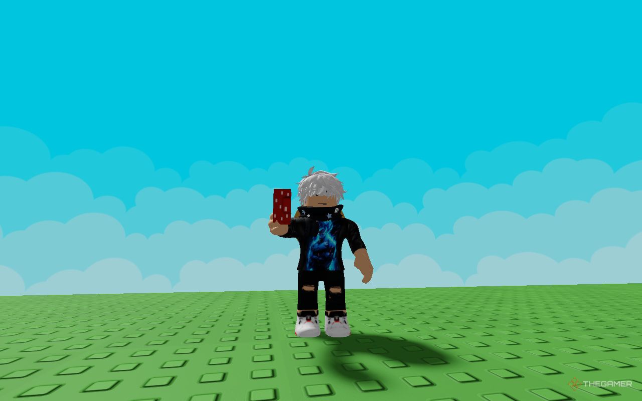 The player holds a mushroom seed in their hand in Grow A Garden.
