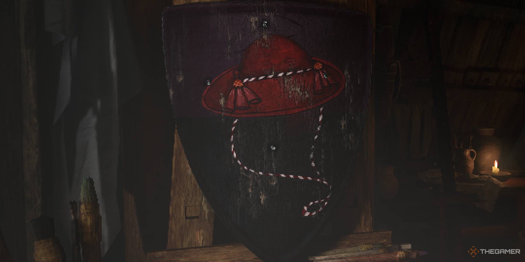 Kingdom Come Deliverance 2 shield painting Cardinal's Hat design with the red brimmed hat with a white and red string.