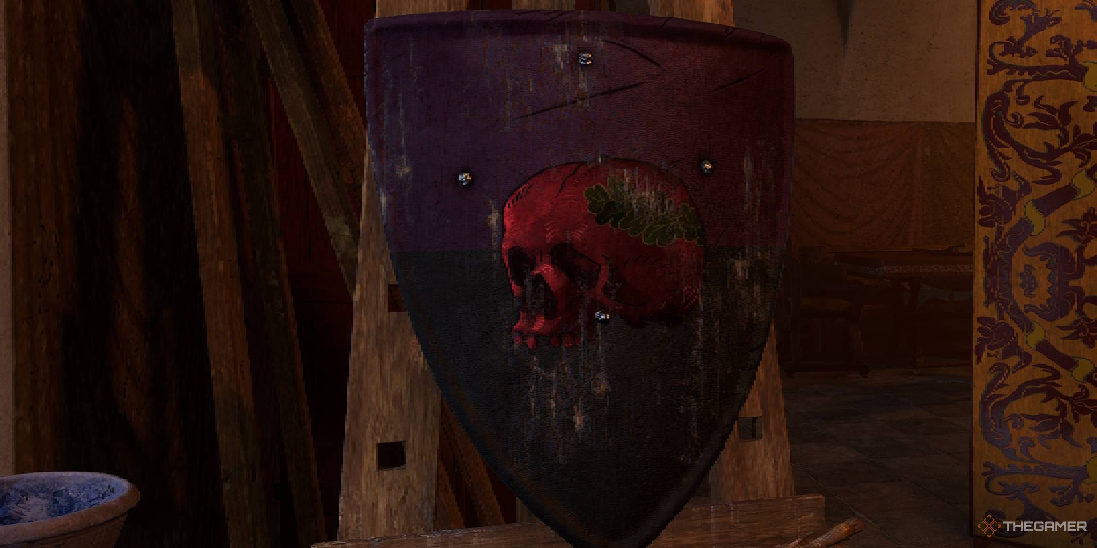 Kingdom Come Deliverance 2 shield painting Skull Gules design with a red skull with a leaf crown.