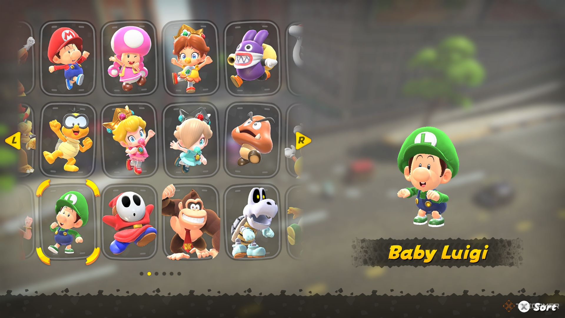 Baby luigi on the selection screen of Mario Kart's state.