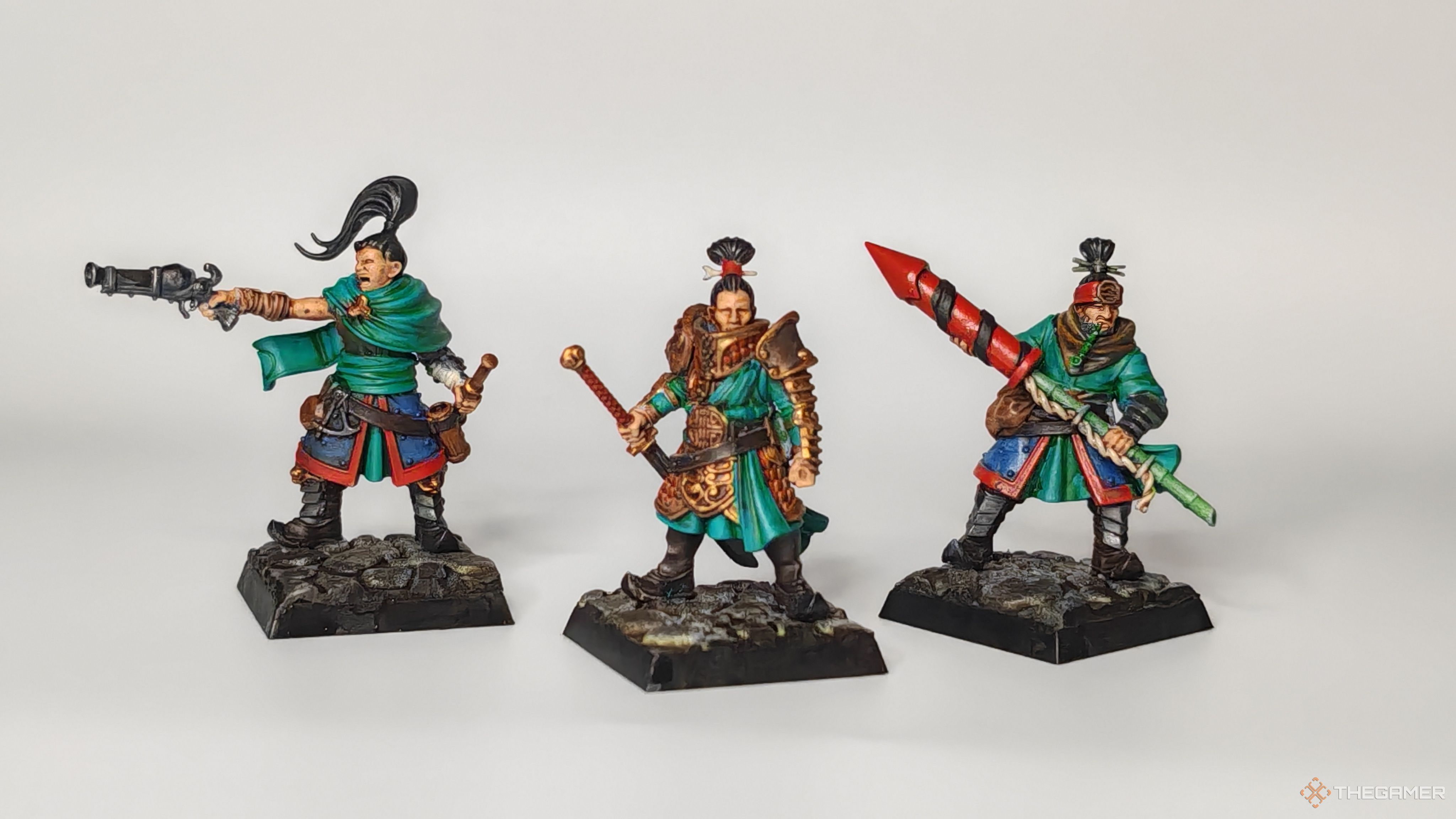 Warhammer The Old World Grand Cathay group of Mordheim explorers, one carrying a firework