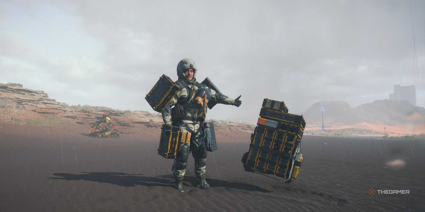 Sam standing next to a dropped backpack in Death Stranding 2: On the Beach.
