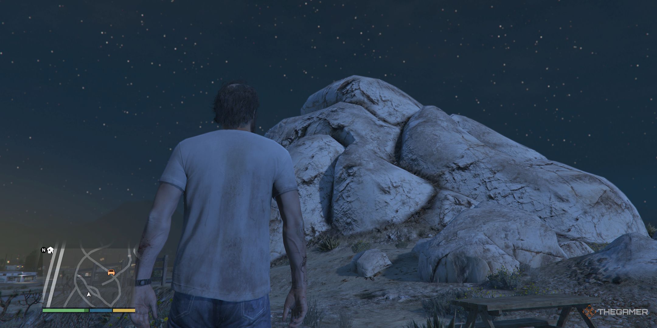 Trevor at Tremic's Rock in Grand Theft Auto 5.