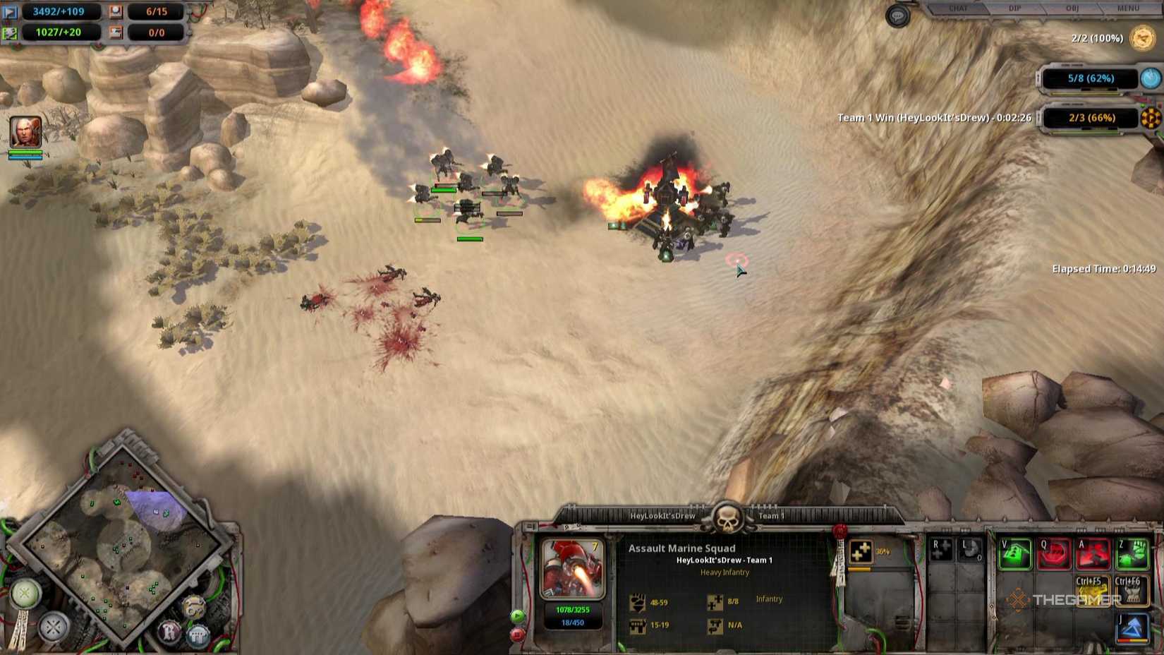 A group of Space Marines raze an enemy building in Warhammer 40000 Dawn of War Definitive Edition.