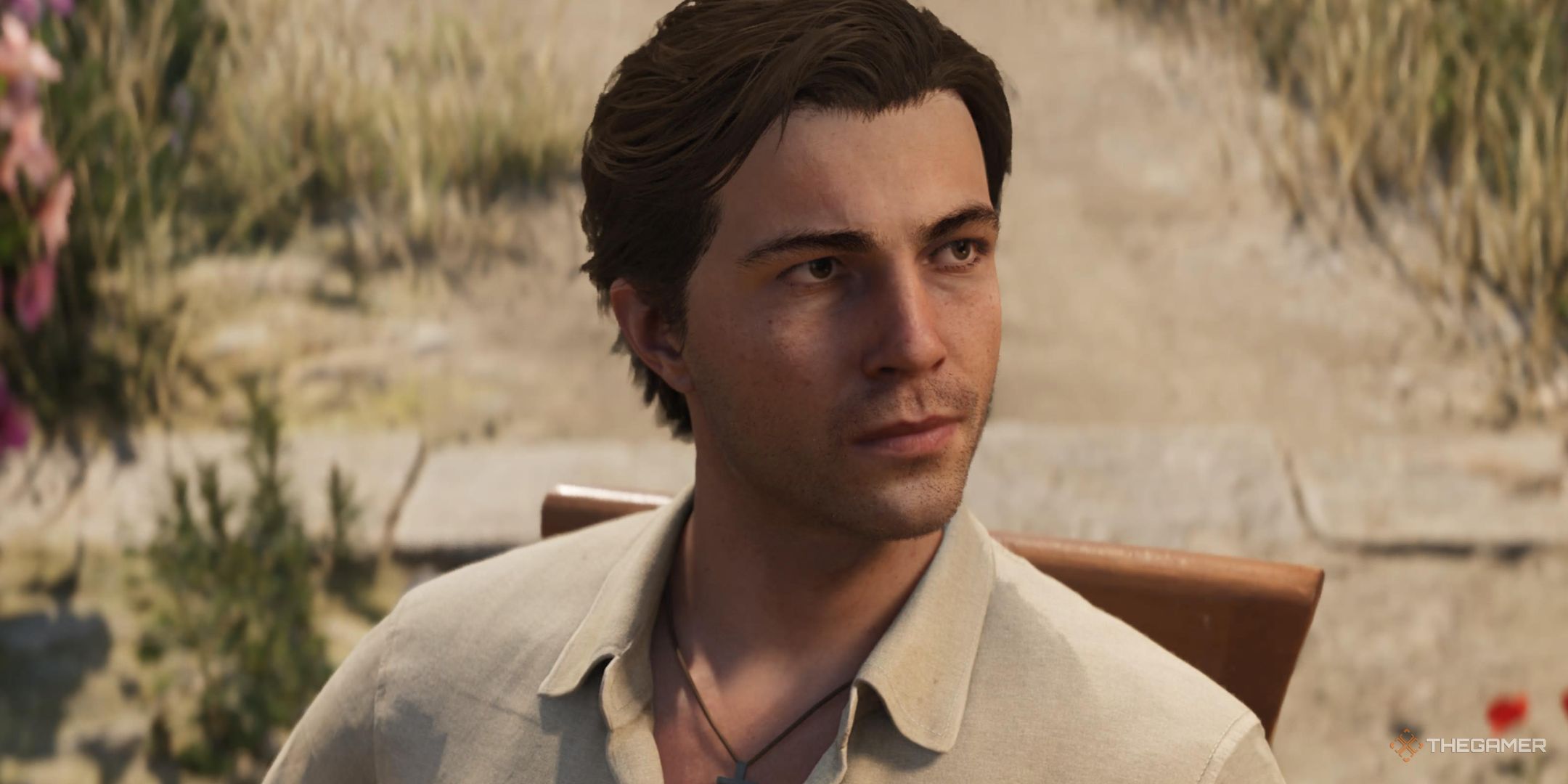 a closeup of enzo favara as his hair grows out in mafia: the old country.