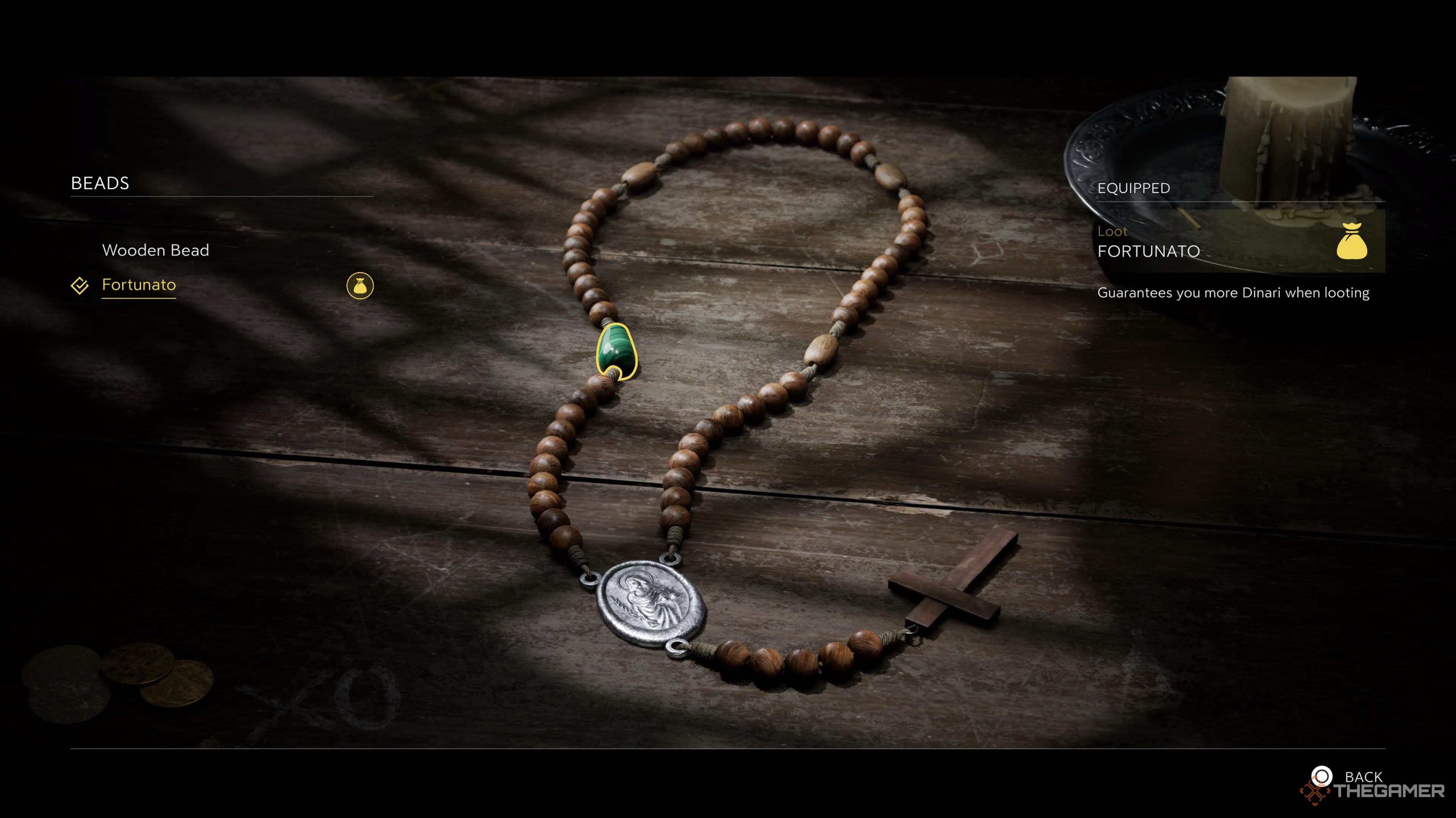 enzo's rosary in mafia: the old country, with the fortunato bead equipped.